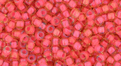 Round Seed Bead by Toho - #979 Luminous Light Topaz / Neon Pink Inside Color Lined