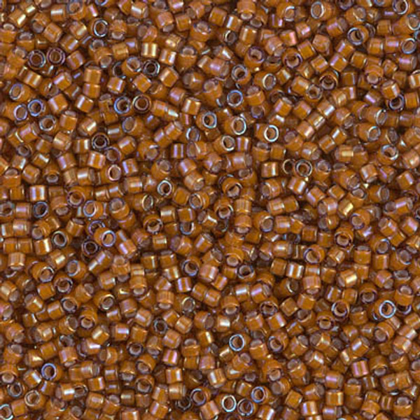 Delica Seed Bead - #1779 White / Dark Topaz Inside Color Lined Rainbow