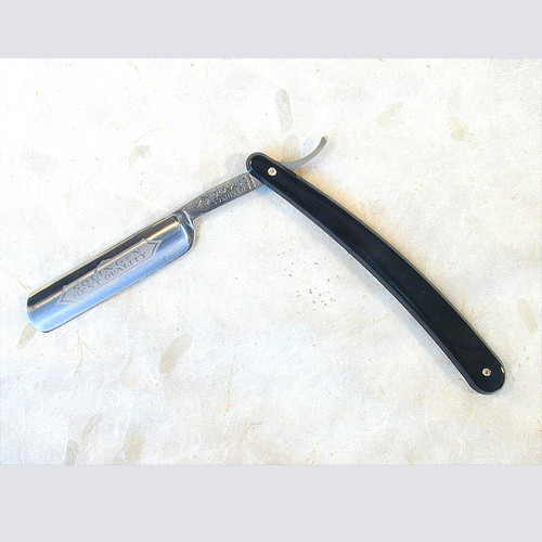 synthetic handle straight razor with carbon steel blade