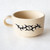 tan melamine soap mug with barbed wire motif