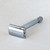chrome plated brass ridged handle double edge razor front view