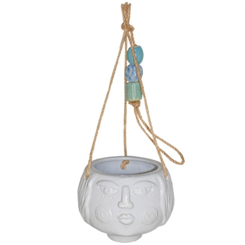 White girl face hanging planter with chunky shades of blue ceramic beads.