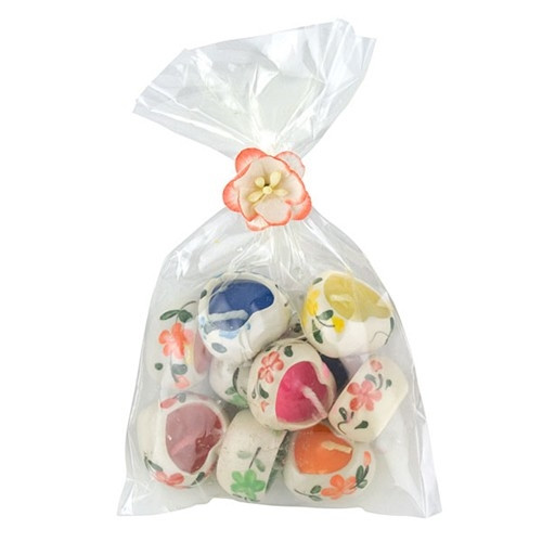 Pack of 10 little ceramic candle hearts - assorted colors and mildly scented.