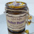 Perfect Buyer Manifesting Candle with lavender, calendula, amethyst,  hydrangea and a genie bottle charm and 2 colored wooden beads.