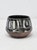 Tea bowl made of red stoneware with hand painting.