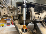 Kooker Tech K0005 Shock Packer Spacer installed on Humvee