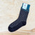Hirsch Natur - Organic Wollsocken Eiskristall Jacquard braun Schoko