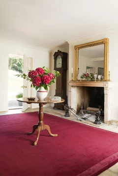 Keepers Red Silk Border rug by Farrow & Ball insitu image