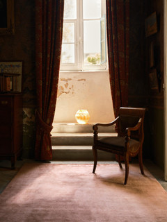 Mohair Sheared rug in Orchid, styled in a sunlit doorway setting