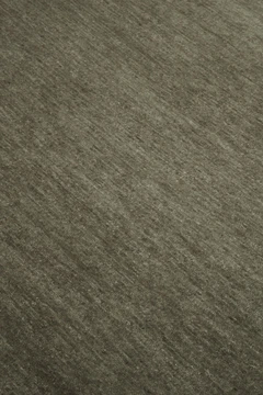 Close-up of Doma rug in Forest, showing wool-silk blend texture