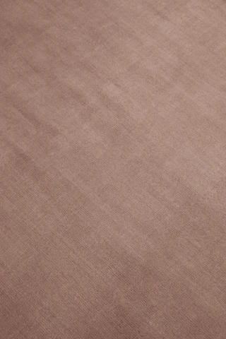 Close-up of Margo rug in Peony, showing wool texture