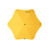 A yellow umbrella with a star-shaped canopy and a central pole. It has a logo on its surface.