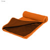 An orange cooling towel rolled out, featuring a textured side and a smooth reverse side, with a logo present.