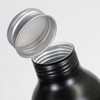 A drink bottle with a black body and a silver screw cap, featuring an open top.