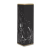A tall patterned box featuring white floral illustrations on a black background, with a gold top edge.