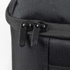 A black travel backpack featuring dual zippers and a textured fabric surface. It has a logo on the side.