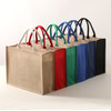 A set of tote bags in various colours: beige, red, green, blue, and black, each with two handles.
