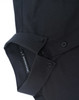 A black long-sleeved cotton blend shirt with a button-up collar and a logo on the inside label.