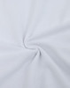 A close-up of white fabric featuring a smooth cotton/poly blend texture, with a slight sheen and circular pattern.