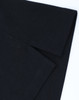 A black cotton/poly pique polo shirt showcasing the folded collar and sleeve detail. It has a logo on the fabric.