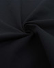 A close-up of black fabric in a swirling pattern, showcasing a soft texture ideal for apparel.