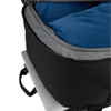A black travel backpack interior showing a blue cushioned compartment and a silver laptop underneath.