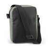 A compact grey and black travel bag with an adjustable strap and a branded logo.
