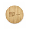 A round wireless charger made of bamboo, featuring a smooth, natural wood finish and a logo.