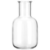 A glass carafe with a smooth, rounded shape, featuring a transparent finish. There is a branded logo on the surface.