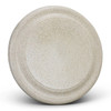 A large, speckled beige plate with a smooth surface and a raised edge, featuring a subtle logo.