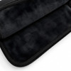 A black neoprene laptop sleeve with a soft interior lining. The zipper is visible along the edge.