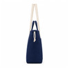 A navy tote bag with cream handles and a drawstring closure, featuring a subtle logo.