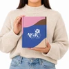 A woman holds a custom box with a locking lid, featuring pink, blue, and brown colours and a logo on the front.