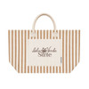 A striped tote bag in beige and brown with a central cream panel and a logo on it. Handles for easy carrying.