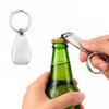 A silver keytag bottle opener being used to open a green glass bottle. The opener has a simple, sleek design.