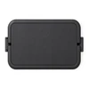 A black double tray lunchbox with a hinged lid and a simple design. It features a logo on the surface.