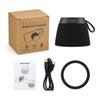 A wireless speaker in black with a textured exterior, accompanied by a box, manual, USB cable, and a magnetic ring.