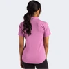 A pink women's polo shirt with a collar and short sleeves, featuring a subtle logo on the back.