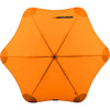 An orange BLUNT Classic Umbrella featuring a star-shaped canopy and a central hub, with a logo present.