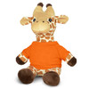A plush toy giraffe with a tan and brown pattern, wearing an orange shirt, sitting upright.