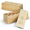 A wooden brain teaser set in a tan box, featuring various wooden puzzle pieces and a logo on the lid.