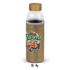 A drink bottle with a clear glass body and a natural beige sleeve featuring a graphic design and a wooden lid.