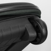 A black wheeled suitcase with a green zipper and a visible wheel assembly. The texture is detailed and sleek.