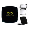 A compact mirror in black with a gold infinity symbol and text. Contains two reflective sides and a branding logo.