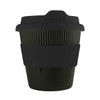 A drink bottle featuring a black reusable coffee cup with a ribbed design and a matching silicone sleeve.