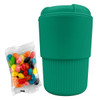 A reusable coffee cup in teal, accompanied by a pack of colourful jelly beans, featuring a textured surface and a lid.