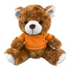 A plush teddy bear with a brown fluffy body and an orange t-shirt, featuring a cute face and white paws.