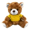 A plush teddy bear in brown fur, wearing a yellow shirt, sitting with its arms and legs outstretched.