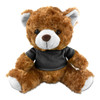 A brown teddy bear plush toy with a black shirt, featuring a cute face and soft fur. It has a logo on its shirt.