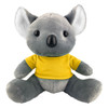 A grey koala plush toy wearing a yellow shirt. The toy has big ears and a friendly expression, with a logo on the shirt.
